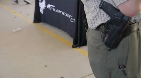 Carring handgun on hip 動画素材 8650366
