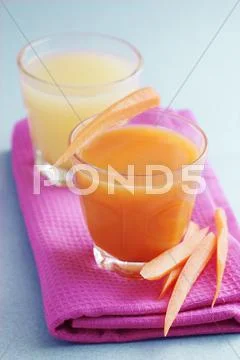 Carrot and pear juice and freshly pressed apple juice Stock Photos