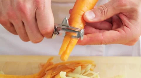 A carrot being peeled Stock Footage 24673185