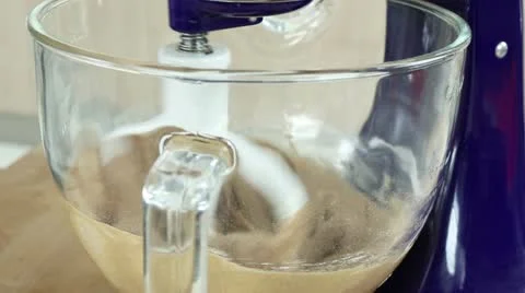 Carrot cake mixture being stirred with a food processor Stock Footage 24671651
