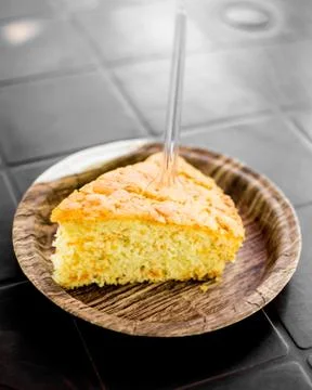 Carrot cake on a wooden plate Stock Photos