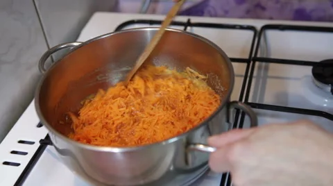 Carrot cooking Stock Footage 58209712