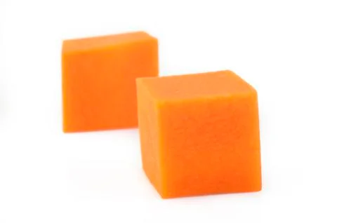 Carrot cube isolated on white background Stock Photos