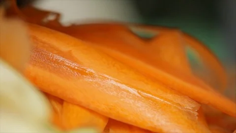 Carrot is Grated into Strips Closeup Stock Footage 99163963