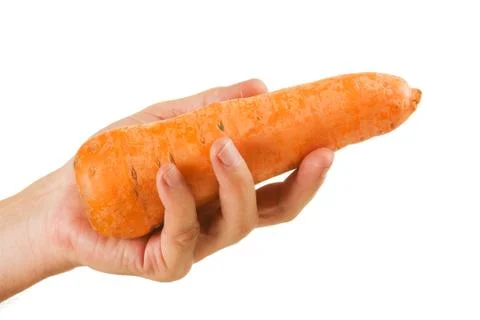 Carrot  in hand Stock-Fotos