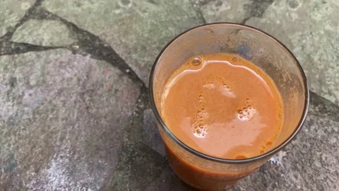 Carrot juice 2 Stock Footage 225799642