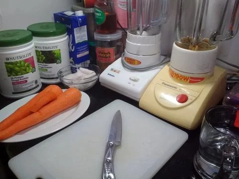 Carrot &amp; knife Stock Photos