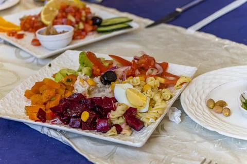 Carrot nuts dated moroccan salad in a bowl. toning. Stock Photos