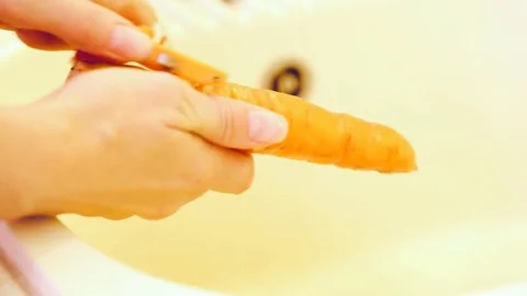 Carrot peeling Stock Footage 81249395