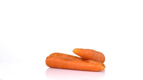 Carrot rotating on white background Stock Footage 171634857