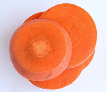 Carrot slice on white background Stock Photos