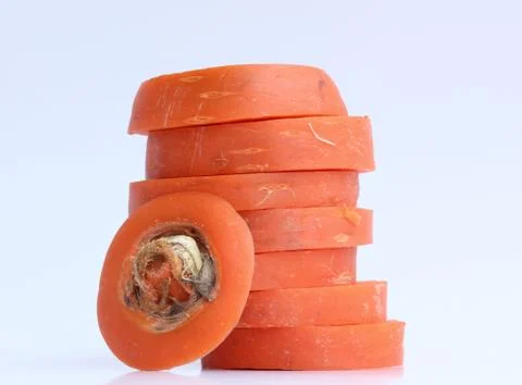 Carrot slice on white background Stock Photos