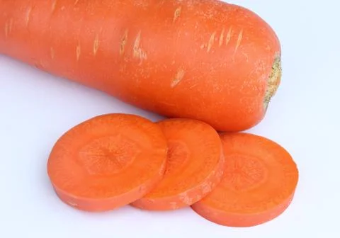 Carrot slice on white background Stock Photos