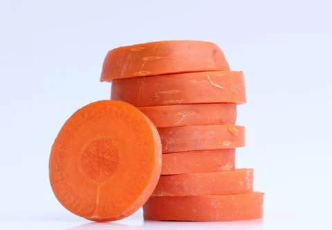 Carrot slice on white background Stock Photos