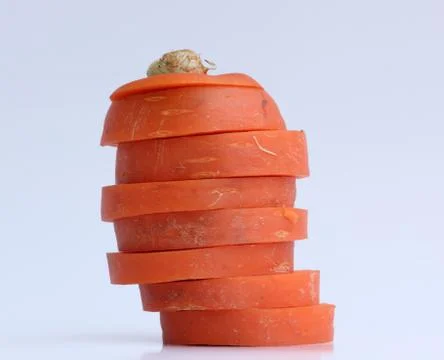 Carrot slice on white background Stock Photos