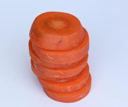 Carrot slice on white background Stock Photos