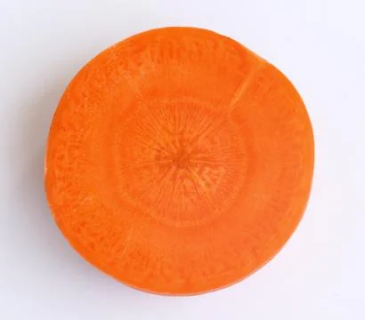 Carrot slice on white background Stock Photos