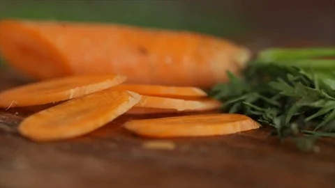 Carrot Sliced Rotates Closeup Stock Footage 99164016