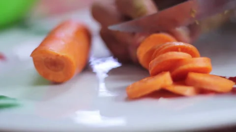 Carrot slices for a salad Stock Footage 35223372