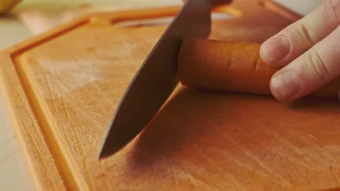 Carrot slicing closeup. Stock Footage 136651538