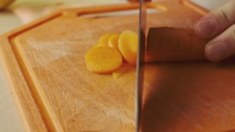 Carrot slicing closeup. Stock Footage 136651540