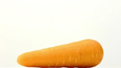 The carrot on the white background Stock Footage 91799272