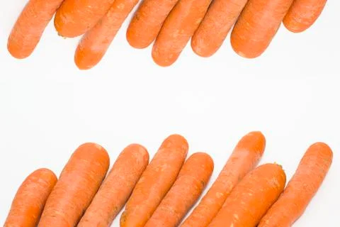 The carrot on white background Stock Photos