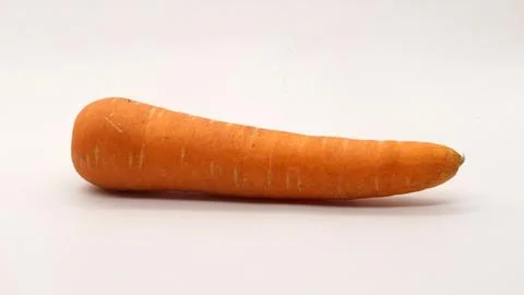 A carrot on a white background Stock Photos