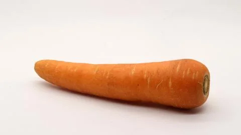 A carrot on a white background Stock Photos