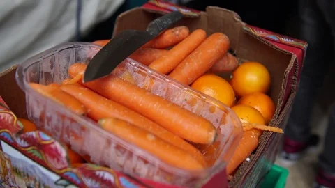 Carrots and oranges ready to be cut, 4K Stock-Footage 72439848