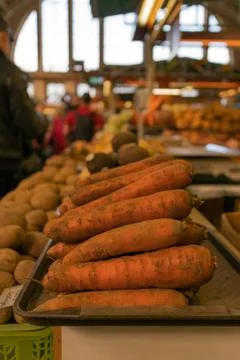 Carrots and root vegetables at a farmers market Stock Photos