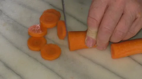 Carrots being chopped Stock Footage 46688381