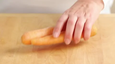 Carrots being peeled Stock Footage 24664531