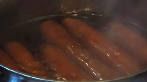 Carrots Boiling in Pot With Steam Close Up Stock Footage 324805842