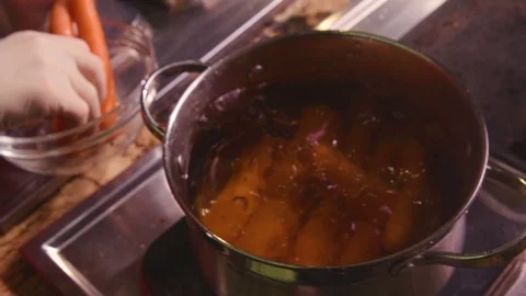 Carrots in boiling water Stock Footage 119300229