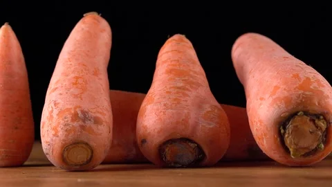 Carrots close up on black background Vídeos de archivo 161982662