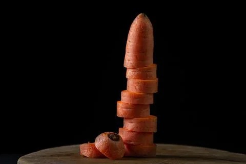 Carrots on a dark background Stock Photos