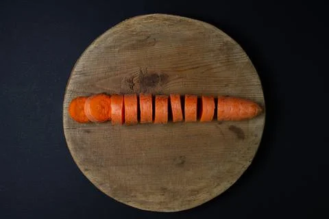 Carrots on a dark background Stock Photos