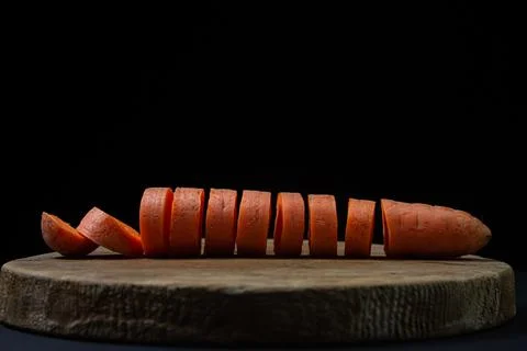 Carrots on a dark background Stock Photos