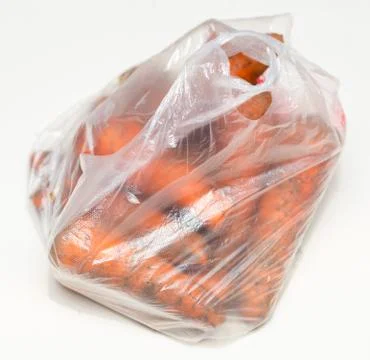 Carrots in pack on a white background Stock Photos