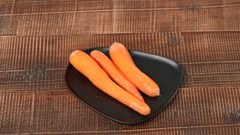 Carrots on plate Stock Footage 183506120