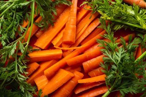 Carrots on a red background Stock Photos