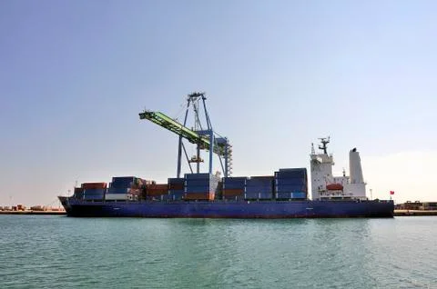 Carry containers to quay Stock Photos