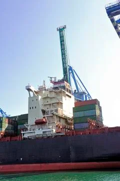 Carry containers to quay Stock Photos