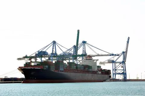 Carry containers to quay Stock Photos