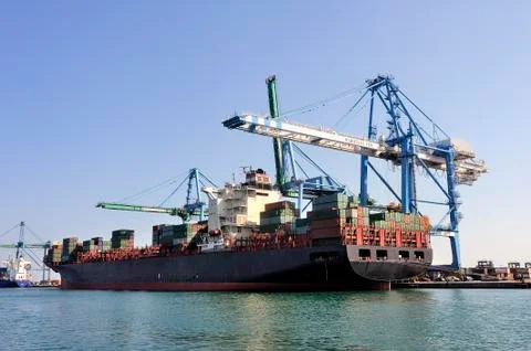 Carry containers to quay Stock Photos