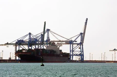 Carry containers to quay Stock Photos