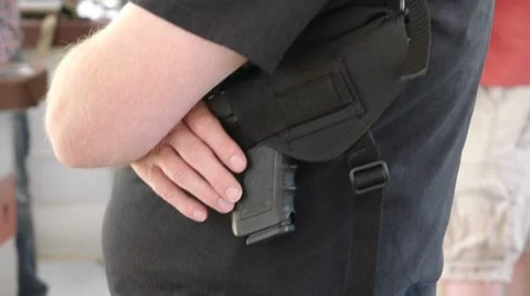 Carrying handgun 動画素材 8650327