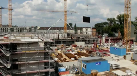 Carrying large metal formwork by tower crane Stock Footage 40730628