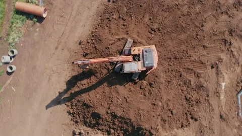 Carrying out construction works with the help of technology. Excavator operator Video stock 157755504